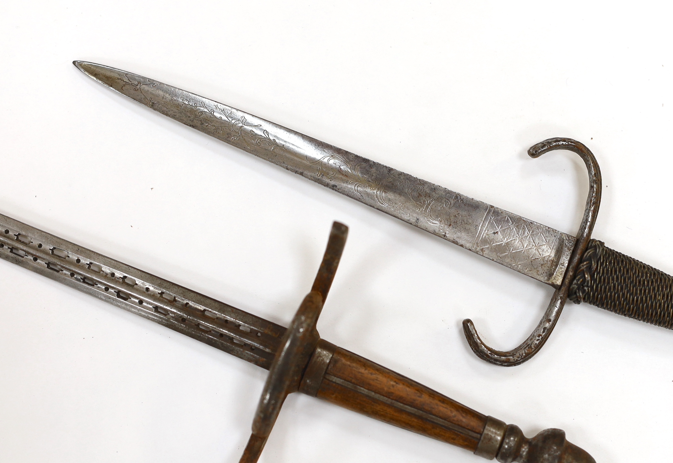 A reproduction stiletto and dagger, stiletto with engraved steel blade, steel pommel and quillon, and wire grip, longest 35.5cm
